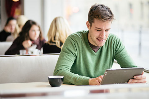 man in front of computer